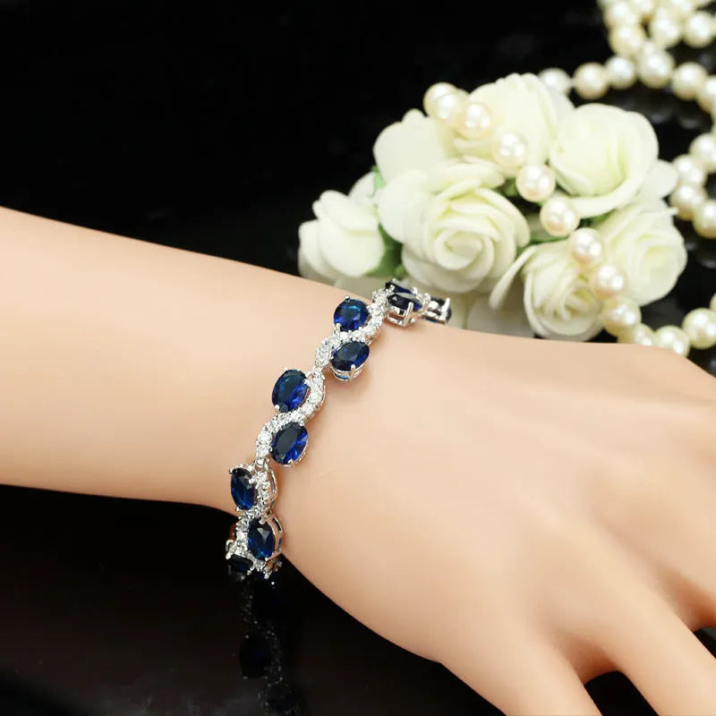 Geometric gold plated copper bracelet with inlaid zircon stones showing simple style design