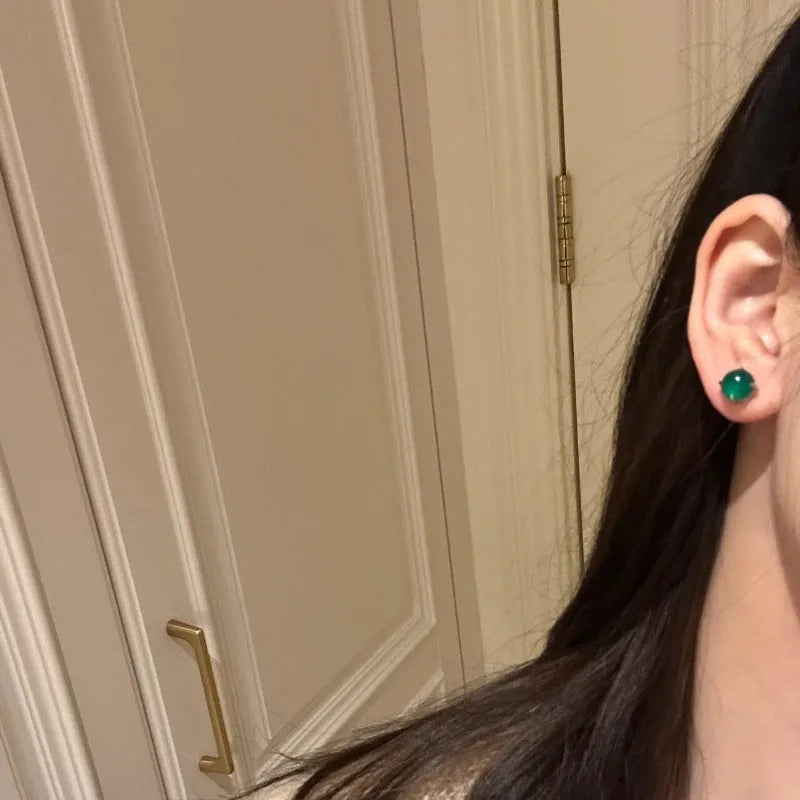 Round chalcedony stud earrings with four-claw setting in Chinese retro style