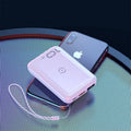 Small square black wireless fast charging power bank with digital display showing battery percentage