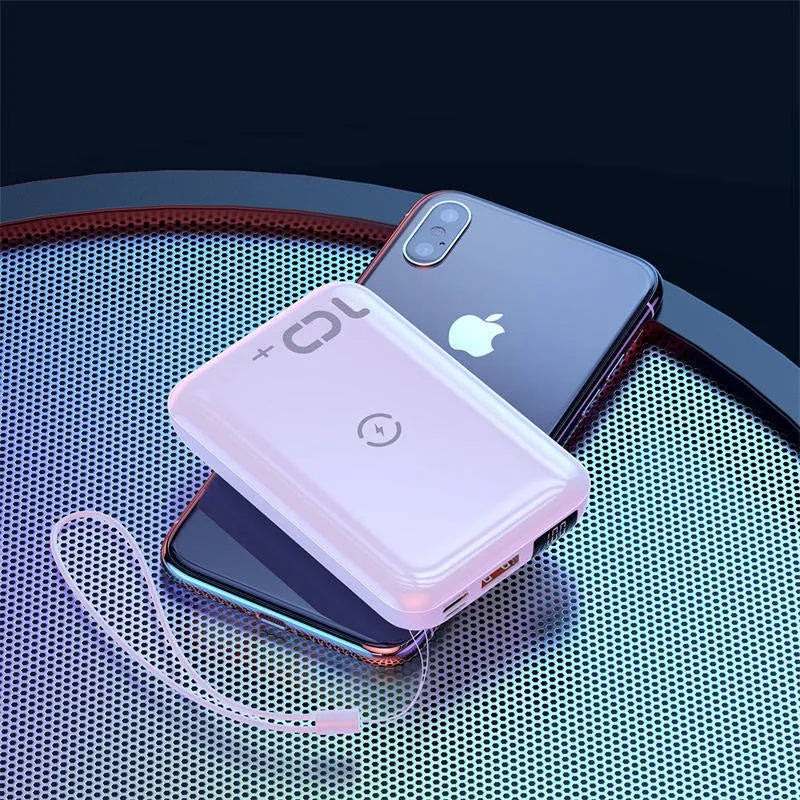 Small square black wireless fast charging power bank with digital display showing battery percentage