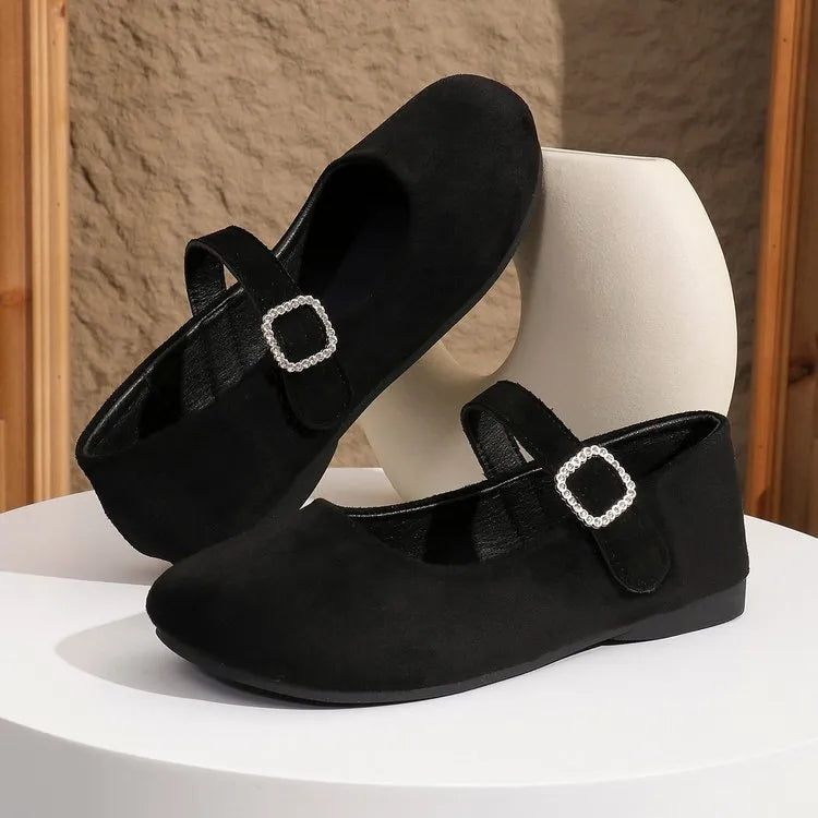 Black canvas women's flat fisherman shoes with low-top design and rubber soles