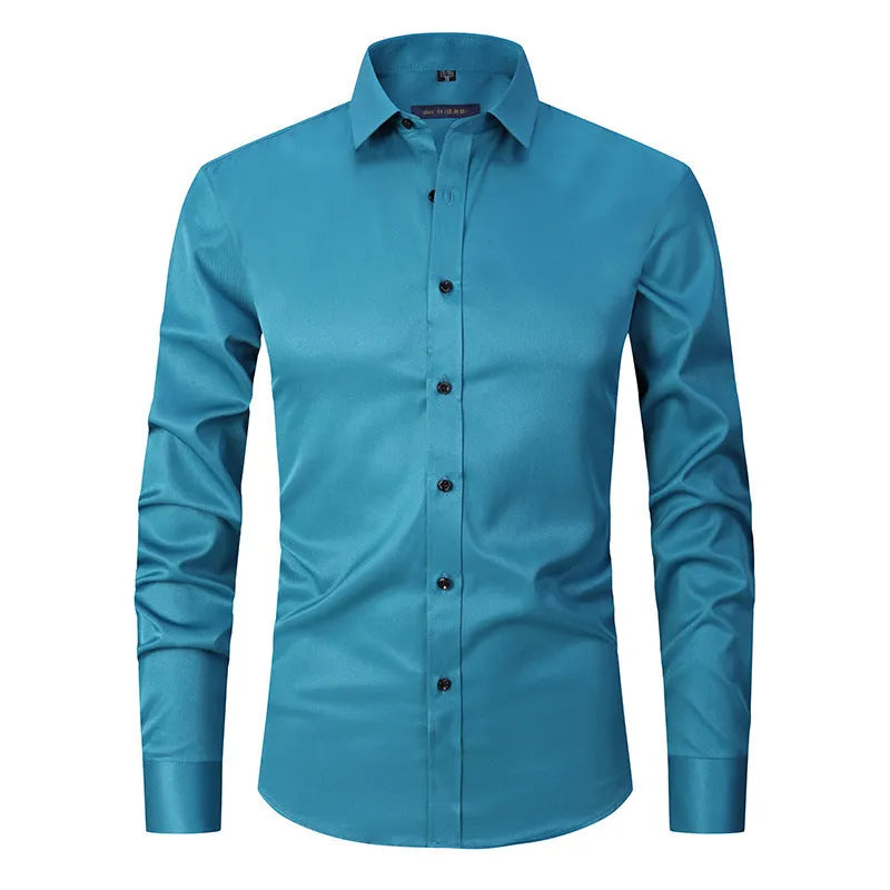 Man wearing a solid-colour stretch long sleeve work shirt made from polyester fabric.