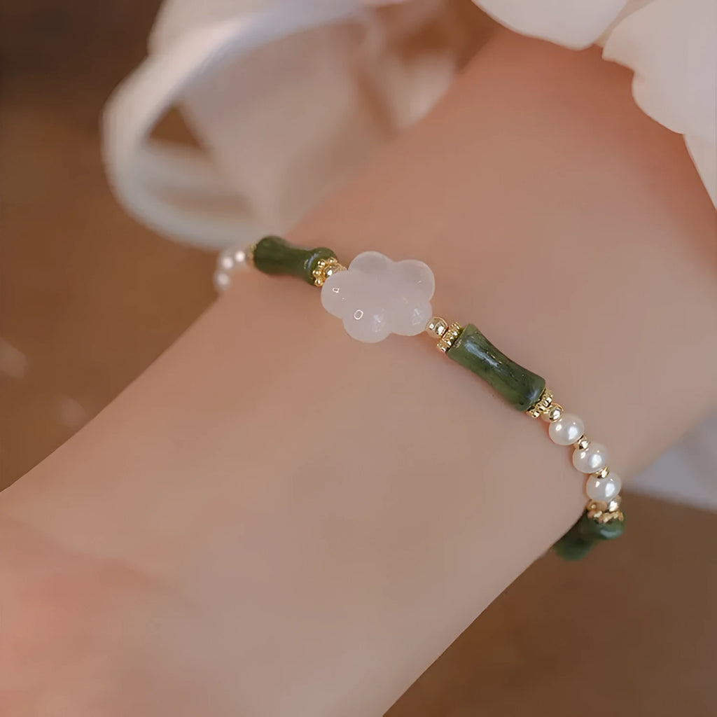 Chinese style bamboo joint bracelet with shell pearls, Hetian jade, and copper connectors