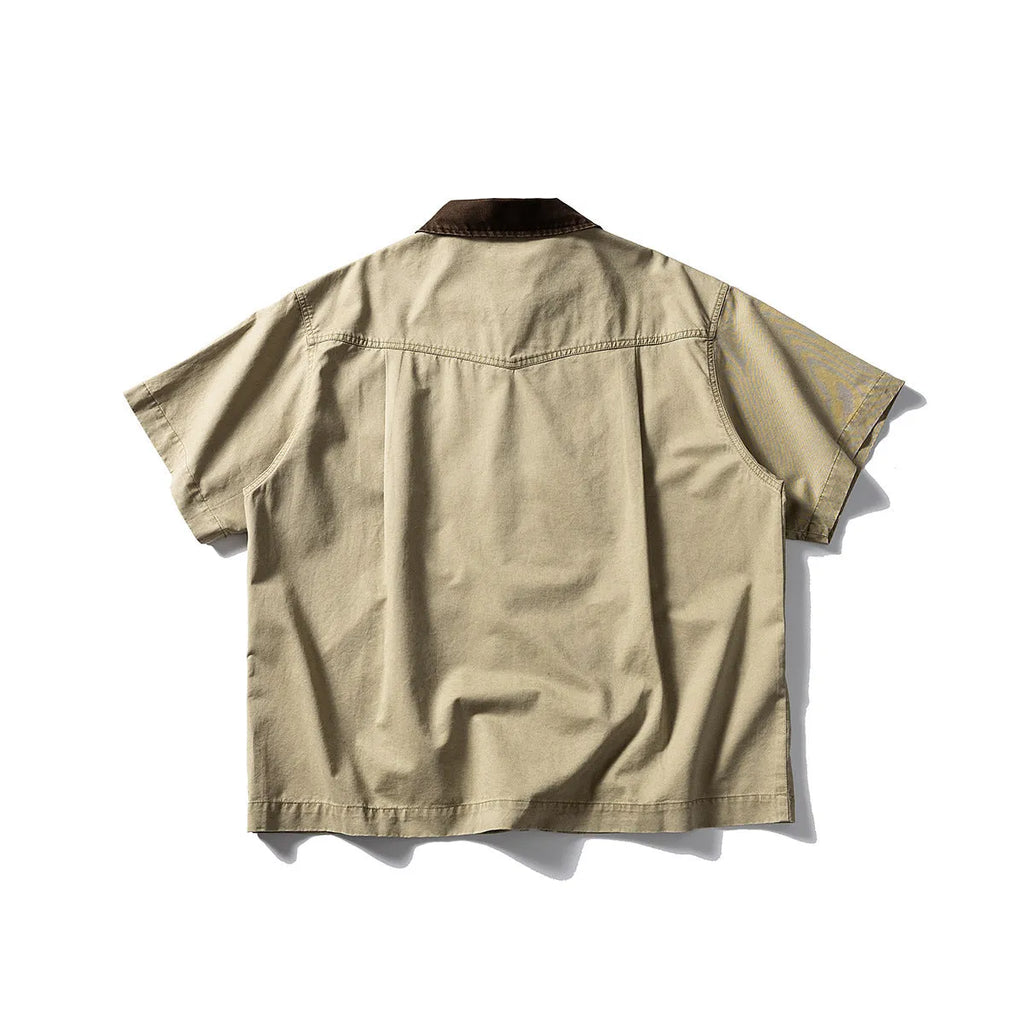 Short-sleeve cotton shirt overalls in a loose cardigan style, shown in khaki and grey colours.