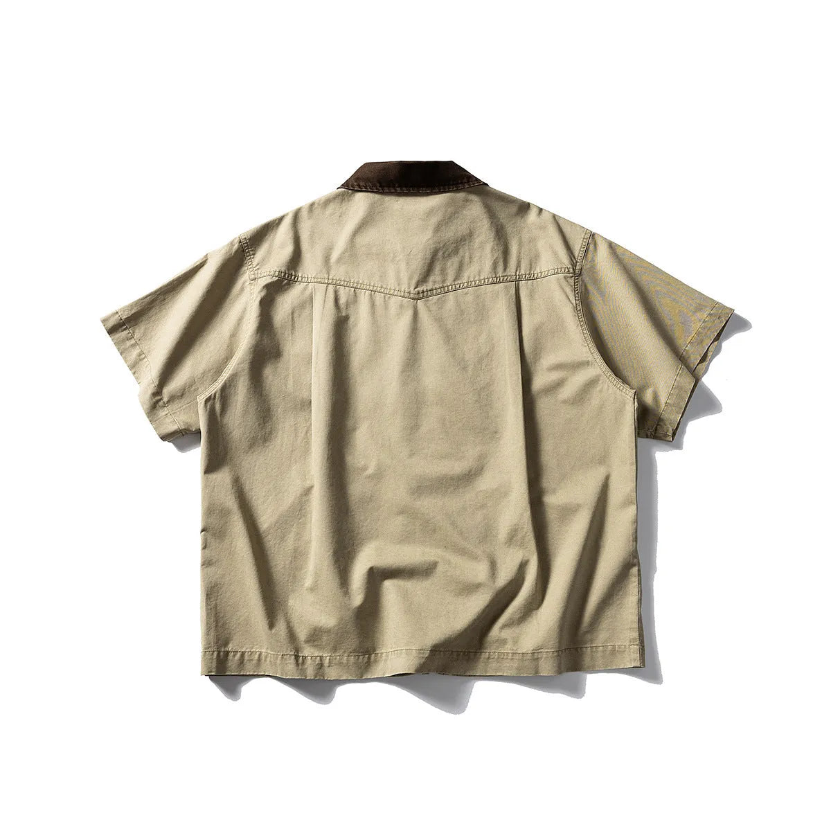 Short-sleeve cotton shirt overalls in a loose cardigan style, shown in khaki and grey colours.