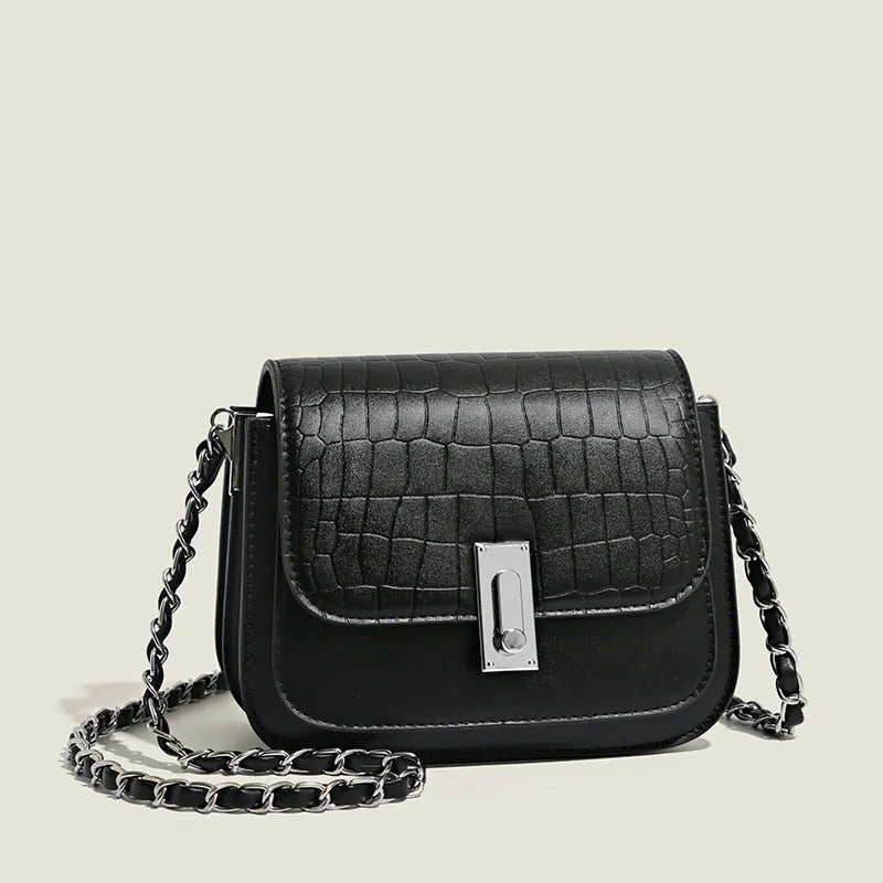 Women's soft PU chain crossbody shoulder bag in black, showing internal phone pocket and outer compartments.