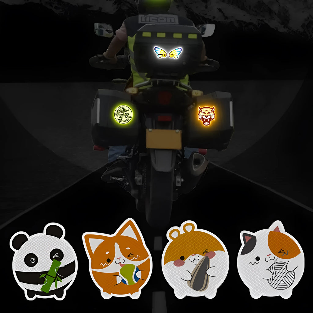 Pair of 9x5cm reflective warning stickers for cars and motorcycles showing sample graphic designs on diamond-grade film.