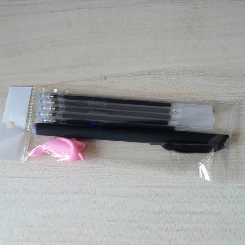 Automatic fade pen set showing pen holder, case, and eight refill units for temporary marking.
