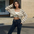 Striped long-sleeved pullover sweater with exposed navel styling in mercerised cotton