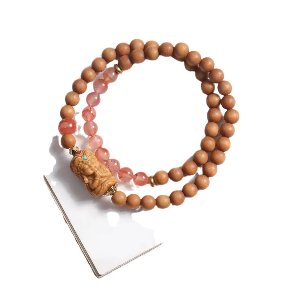 Brown sandalwood bracelet with South Red double circle design and 6mm round beads
