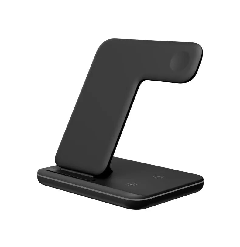 White three-in-one wireless charging stand for mobile phone smartwatch and headset on desktop