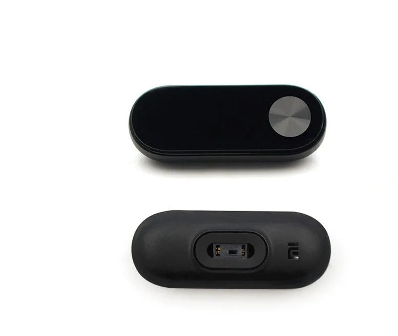 Black Xiaomi Mi Band 2 smart wristband with OLED screen on a textured thermoplastic elastomer strap.