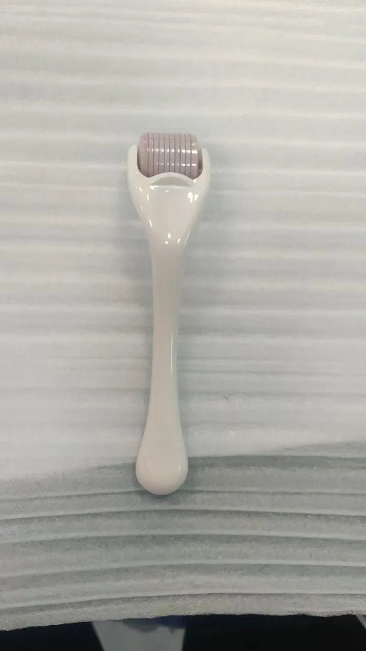 540 micro needle mechanical derma roller with black handle and coloured wheel options