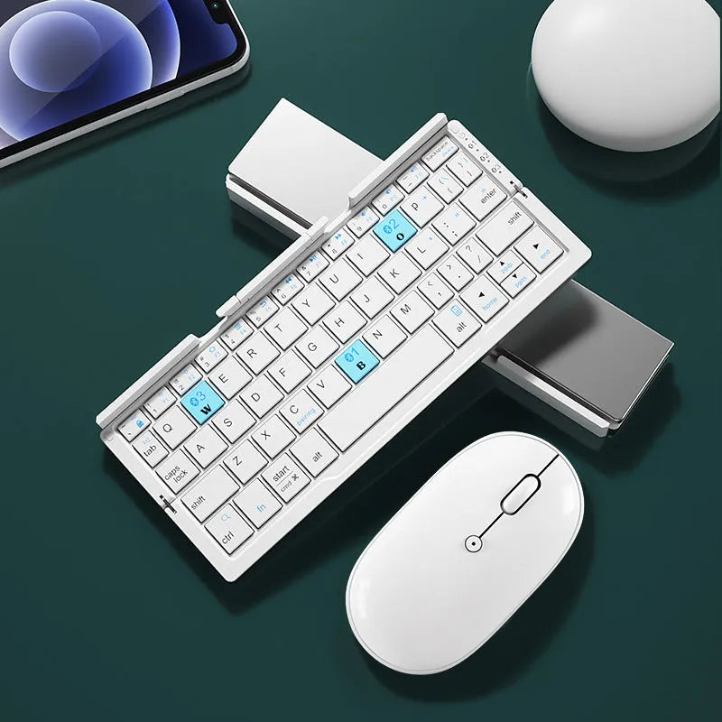 Aluminium folding Bluetooth keyboard with stand holding a smartphone
