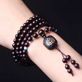 Zambian rosewood bead bracelet with 108 flat lotus pendant beads measuring 0.6 cm each