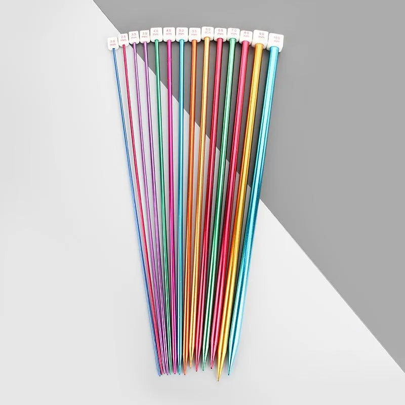 Set of lengthened crochet hooks with protective caps, showing hooks in various metric sizes from 2.0mm to 10.0mm.
