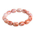 Original design agate bracelet with cherry blossom colour barrel beads and Ruyi charm.