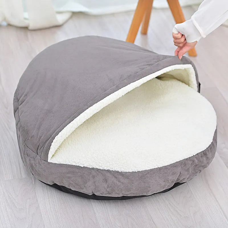 Brown fabric dog kennel with a removable, washable cover for small to medium sized dogs.