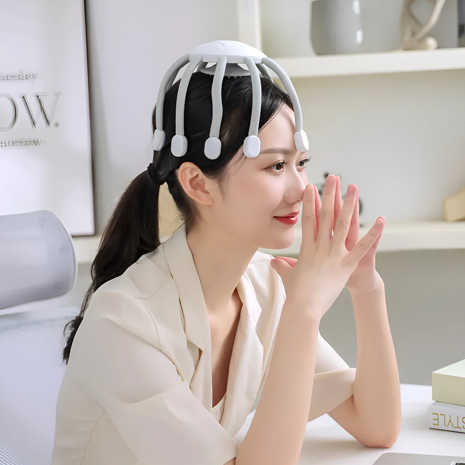 Black and white USB-powered head massagers with multiple vibrating claws for scalp relaxation.