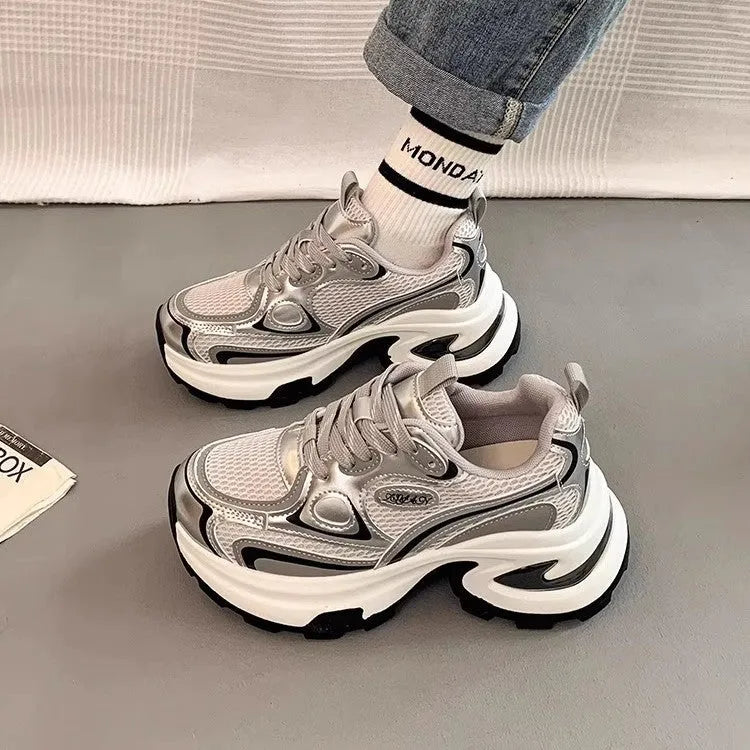 Women's silver and red mesh breathable platform sneakers with round toe and flat rubber sole.