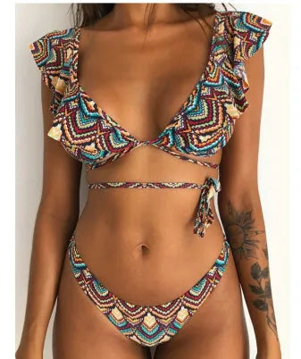 Yellow floral printed women's split bikini swimsuit on hanger showing front design