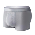 Men's solid colour underwear with massage particles in milk silk fabric showing mid waist design