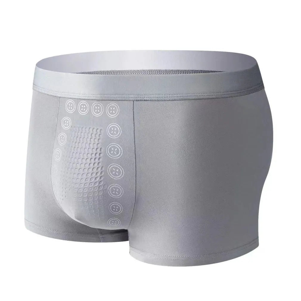 Men's solid colour underwear with massage particles in milk silk fabric showing mid waist design