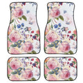 Set of four black printed rubber car floor mats with textured surface, showing thickness.