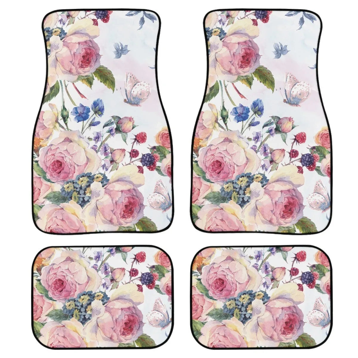 Set of four black printed rubber car floor mats with textured surface, showing thickness.