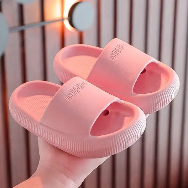 Children's mixed colour EVA slippers with a non-slip sole, shown in sizes for kids.