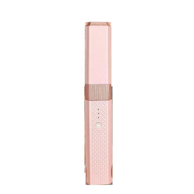 Pink and green cordless USB hair straightener and curling iron with ceramic plates.