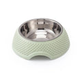 Set of four stainless steel pet bowls in blue, green, and pink colours on a non-slip base