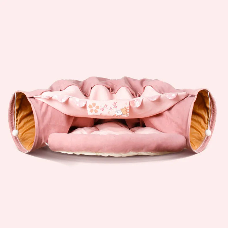 Collapsible cloth cat tunnel folded and unfolded, showing bar design pattern.