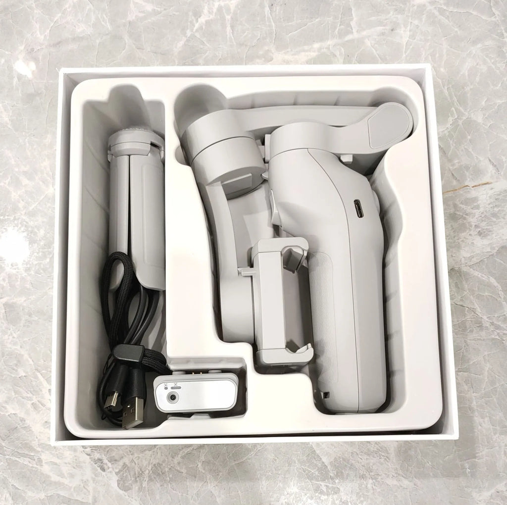 New foldable handheld stabiliser in silver grey for mobile phone with Type-C cable and manual
