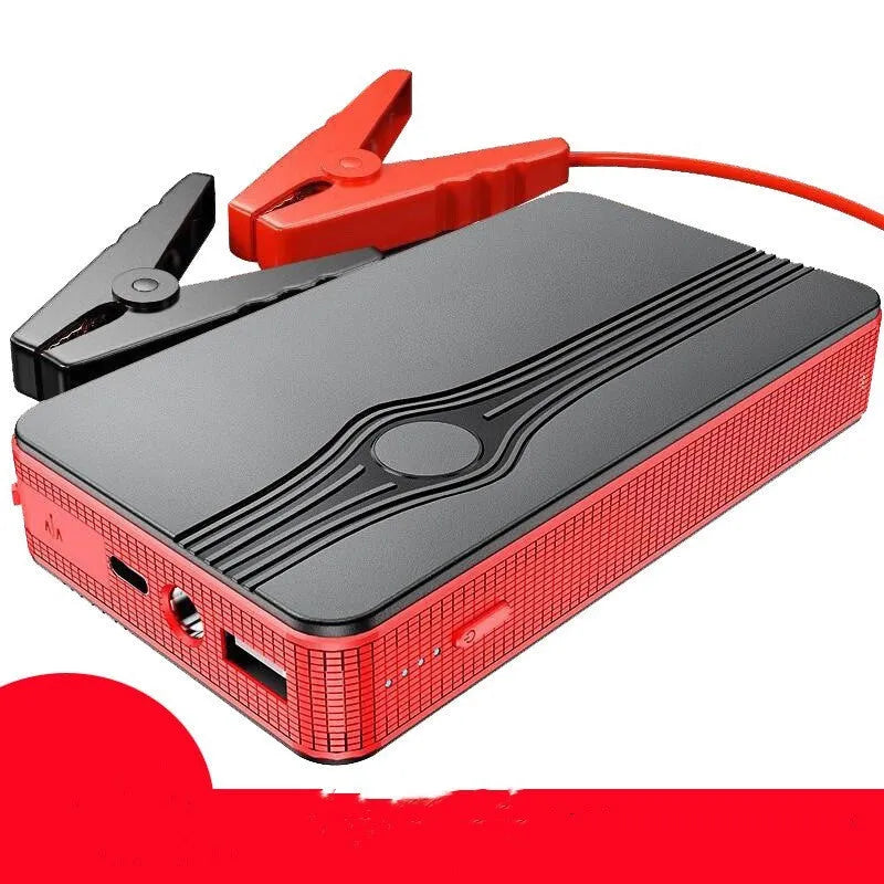 Red K4-E portable car jump starter and power bank unit with USB port and display.