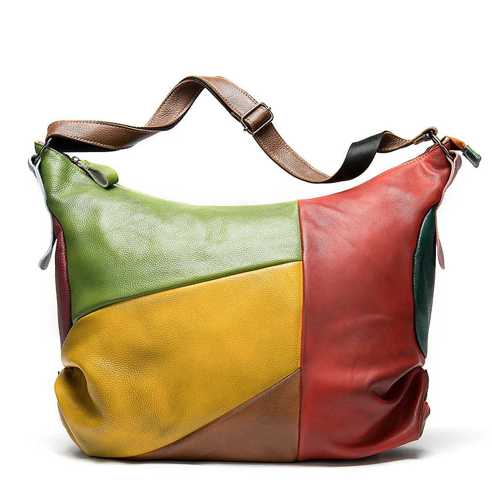 Brown cowhide leather crossbody travel bag with dimensions 48cm by 15cm by 37cm.