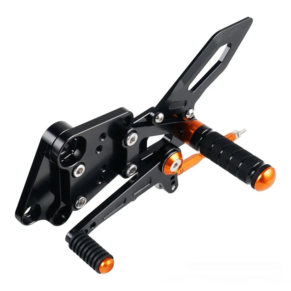 KTM Duke rear shift pedal support assembly bracket in black or orange for 125 200 250 390 models