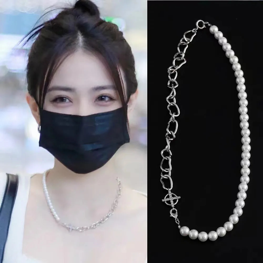 White acrylic geometric asymmetric pendant on twisted chain clavicle necklace