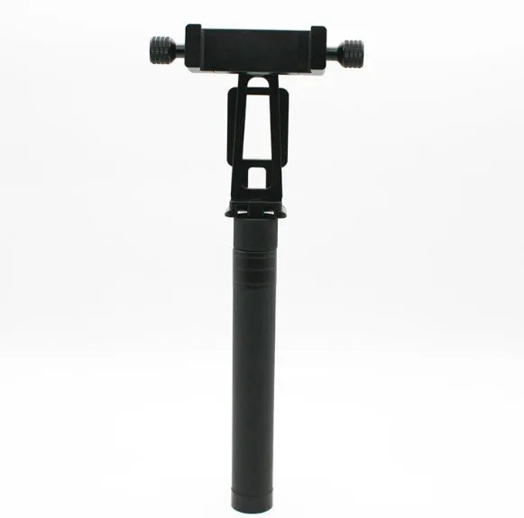 Black retractable selfie stick extended to full length with phone attached, showing detachable tripod legs and wireless remote.