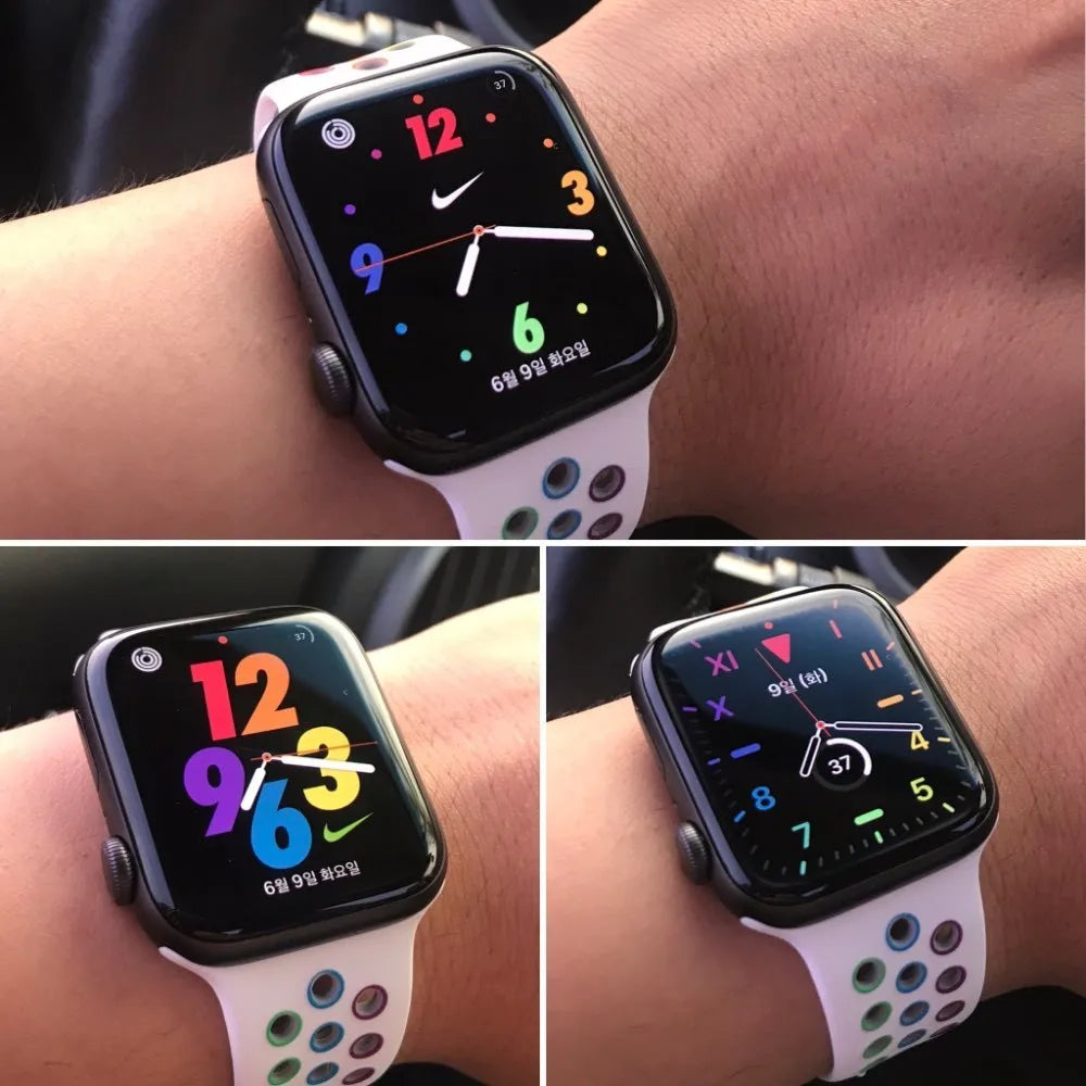 Silicone sports wristband with a single buckle clasp in black, white, and rainbow colours.