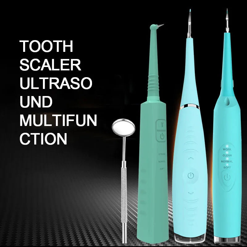 Pink and blue electric dental scaler tool with silicone handle on a bathroom counter.