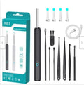 NE3 wireless otoscope ear cleaner with camera, spoon heads, and charging cable on a white background.