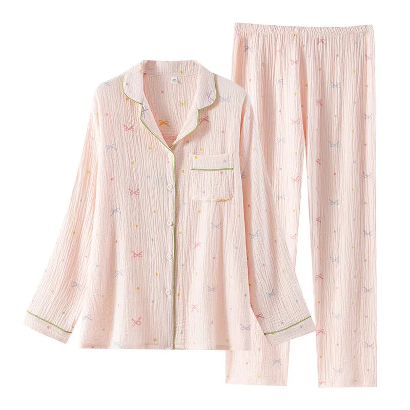 Women's long sleeve cotton pajama set in pink, featuring a crepe cloth top and trousers for homewear.