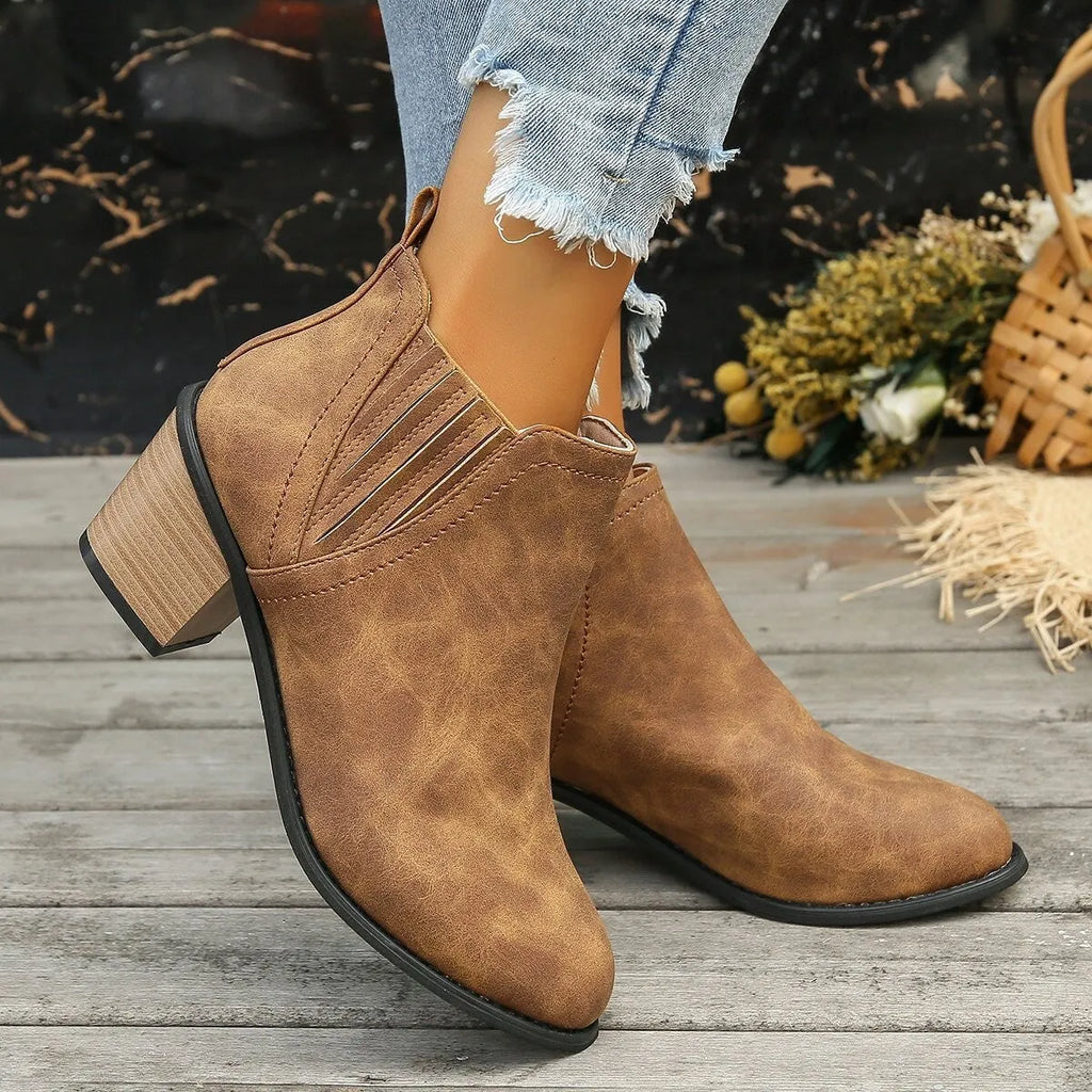 Women's black ankle boots with pointed toe and thick square low heel for autumn winter wear