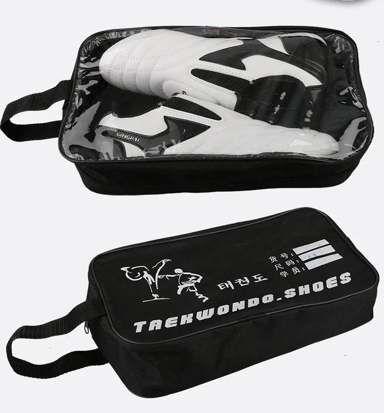 Black and white children's Sanda Taekwondo martial arts shoes with a soft sole and widened fit.