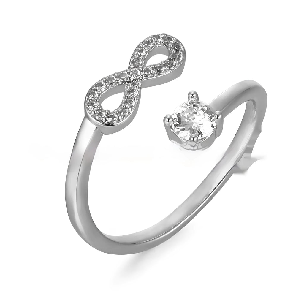 Open geometric ring with a custom 'A' letter made from inlaid zircon stones in a gold metal finish.