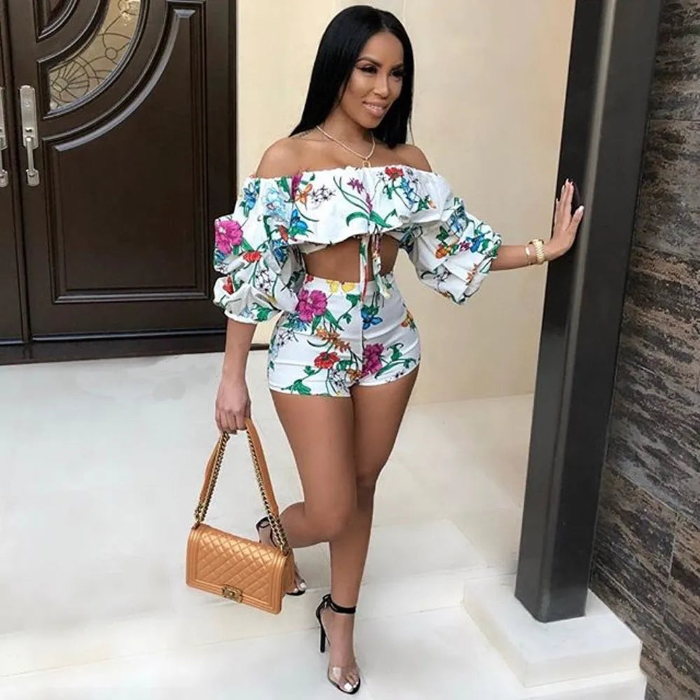 Women's multicolour digital print pyjama set with a short top featuring fluffy long sleeves and matching shorts.