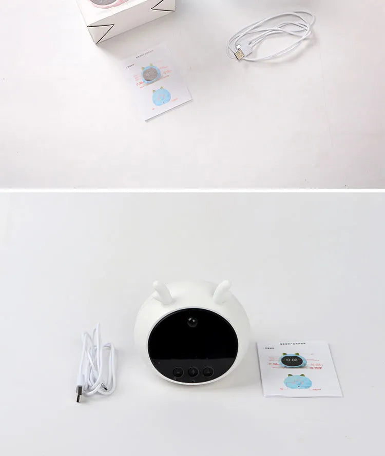 Smart digital alarm clock with silicone casing featuring voice control and a motion sensor.