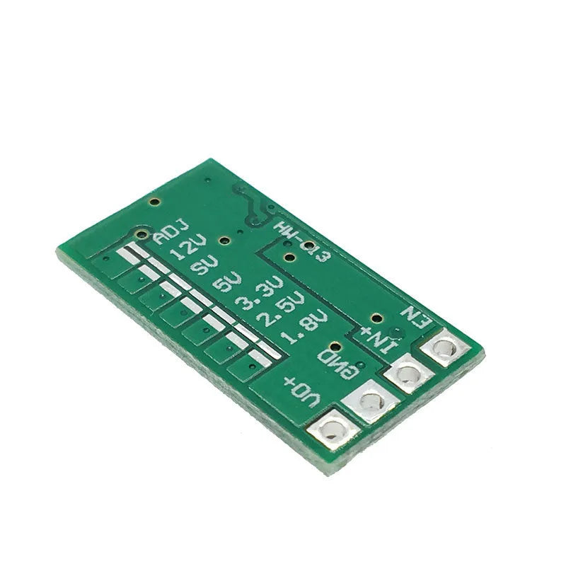 Green 25x21mm DC-DC buck converter module for 12-24V to 5V conversion