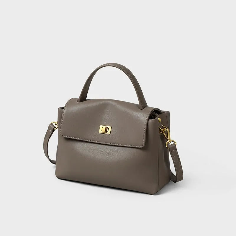 High-grade genuine leather women's postman handbag in grey viney with lock closure and sandwich pocket